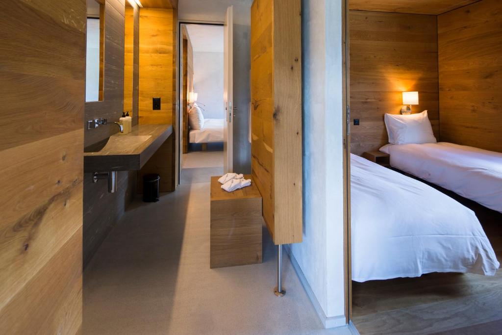 Postel nebo postele na pokoji v ubytování rocksresort
