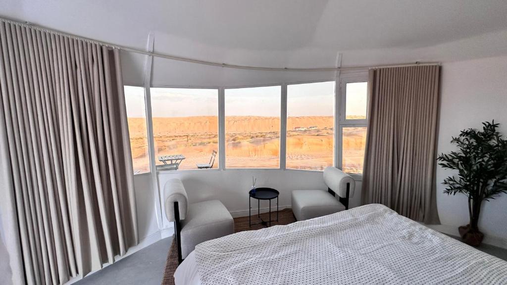 Letto o letti in una camera di Starry Domes Desert Camp