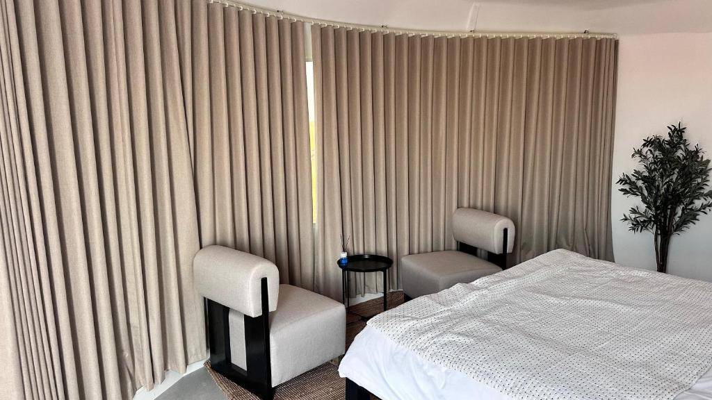 Letto o letti in una camera di Starry Domes Desert Camp
