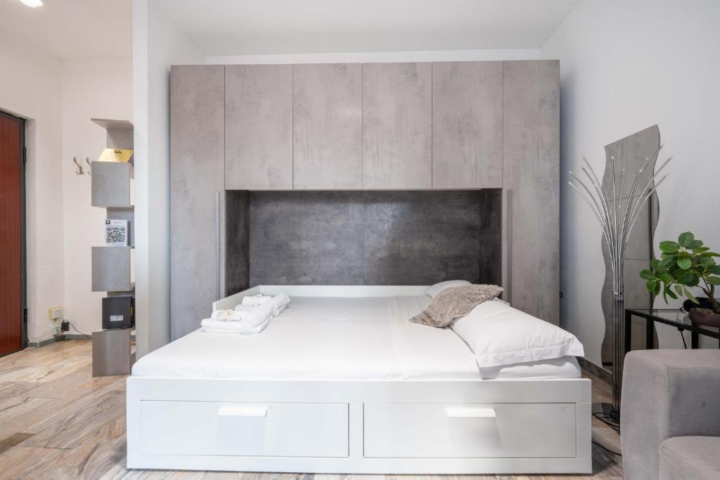 Posteľ alebo postele v izbe v ubytovaní Suite 12 Milano centro parking free