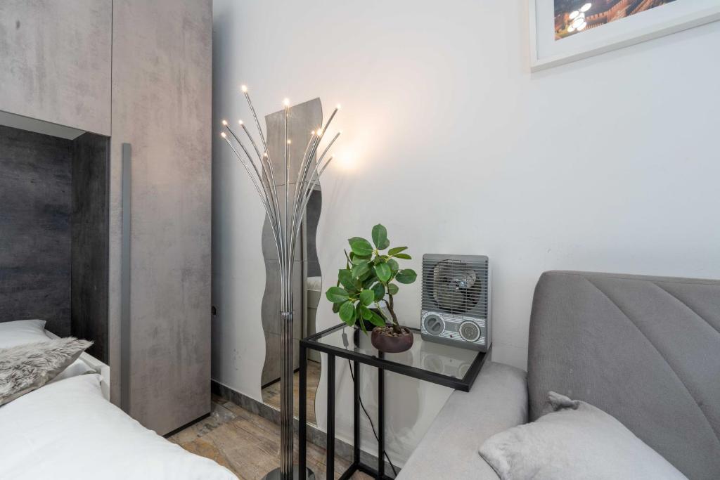 Posteľ alebo postele v izbe v ubytovaní Suite 12 Milano centro parking free