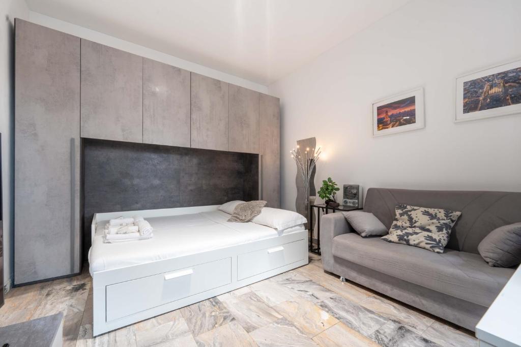 Posteľ alebo postele v izbe v ubytovaní Suite 12 Milano centro parking free