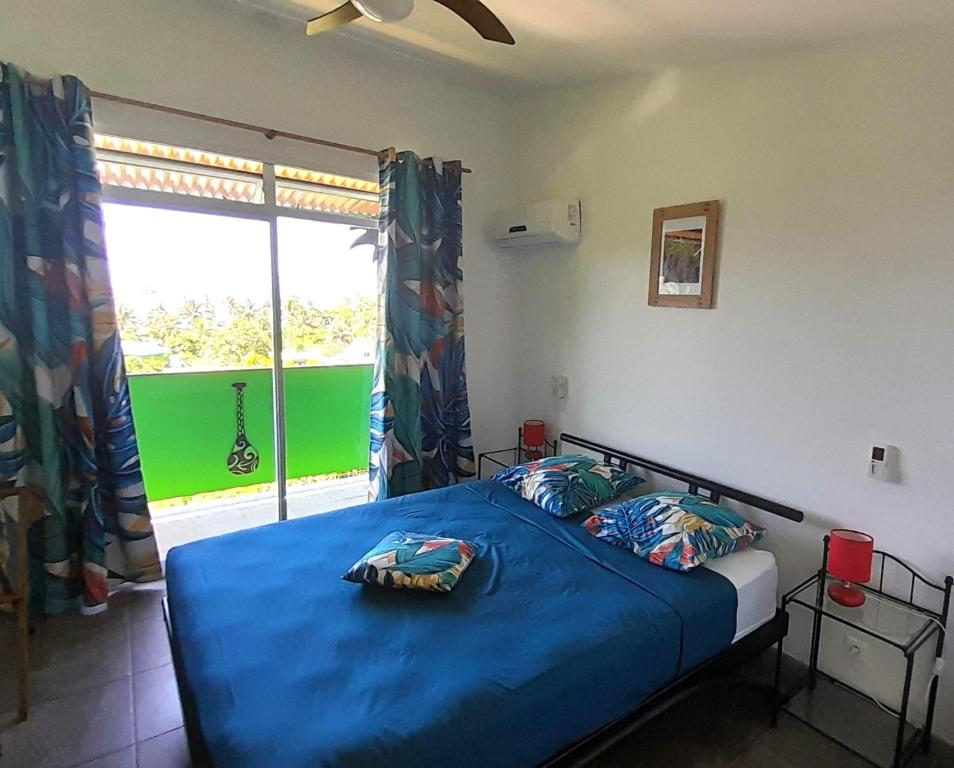 Postelja oz. postelje v sobi nastanitve Fare Arana Mooréa Guesthouse