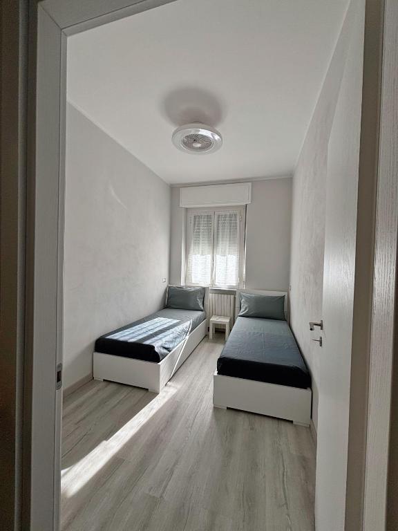 Postel nebo postele na pokoji v ubytování B&B Stella
