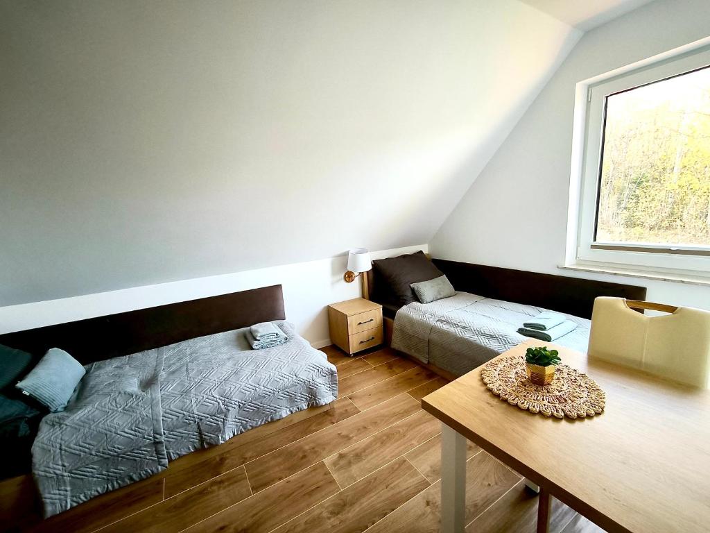 Postel nebo postele na pokoji v ubytování Domki Bobelina