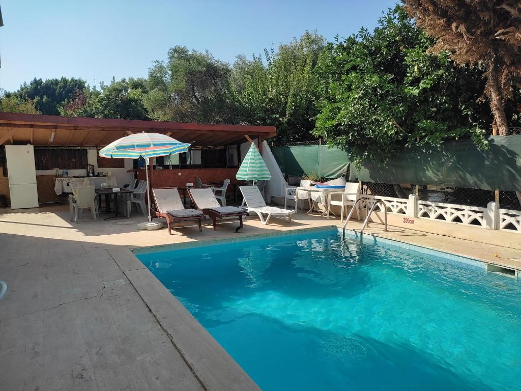 The swimming pool at or close to Garden Prizma Rooms&Aparts