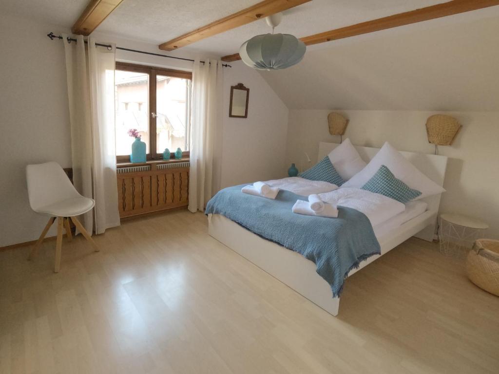 Postel nebo postele na pokoji v ubytování Sonnes Apartment