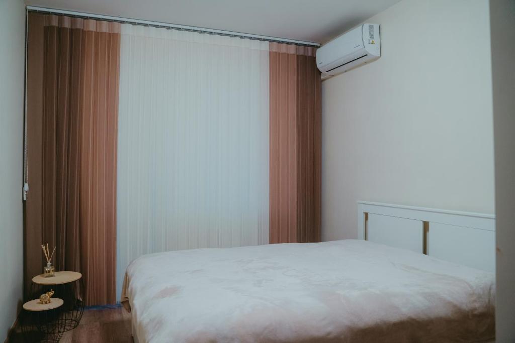 Postel nebo postele na pokoji v ubytování Varna City Apartment