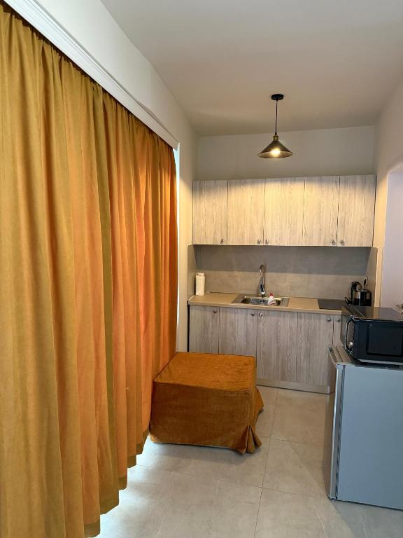 Kuchyň nebo kuchyňský kout v ubytování STAY-FIVE rooms & apartments