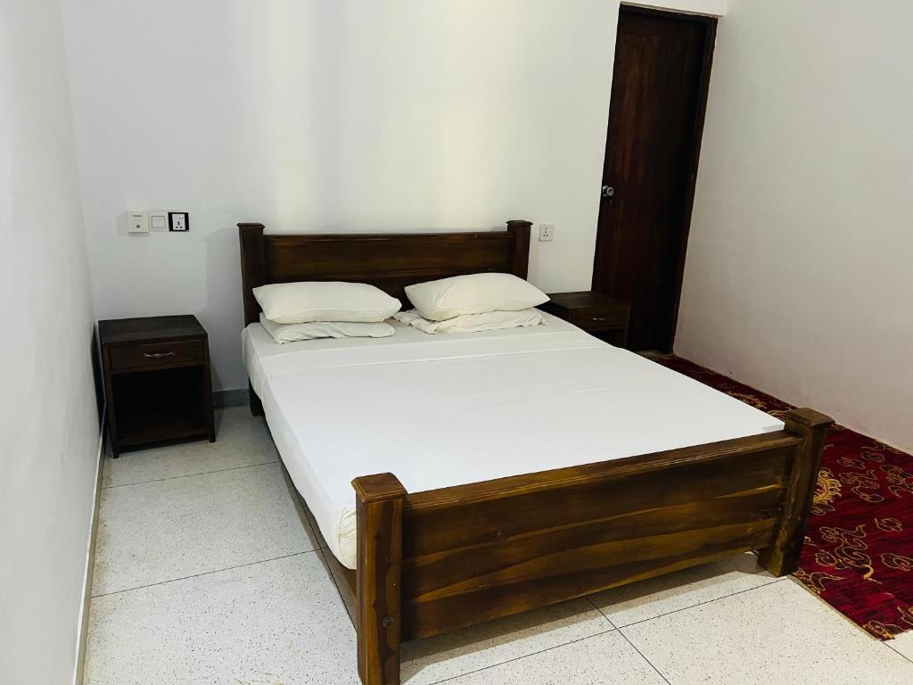 Postel nebo postele na pokoji v ubytování Kingfisher Resort & Retreat Sigiriya