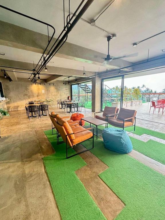 Posezení v ubytování Maya Hostel El Nido