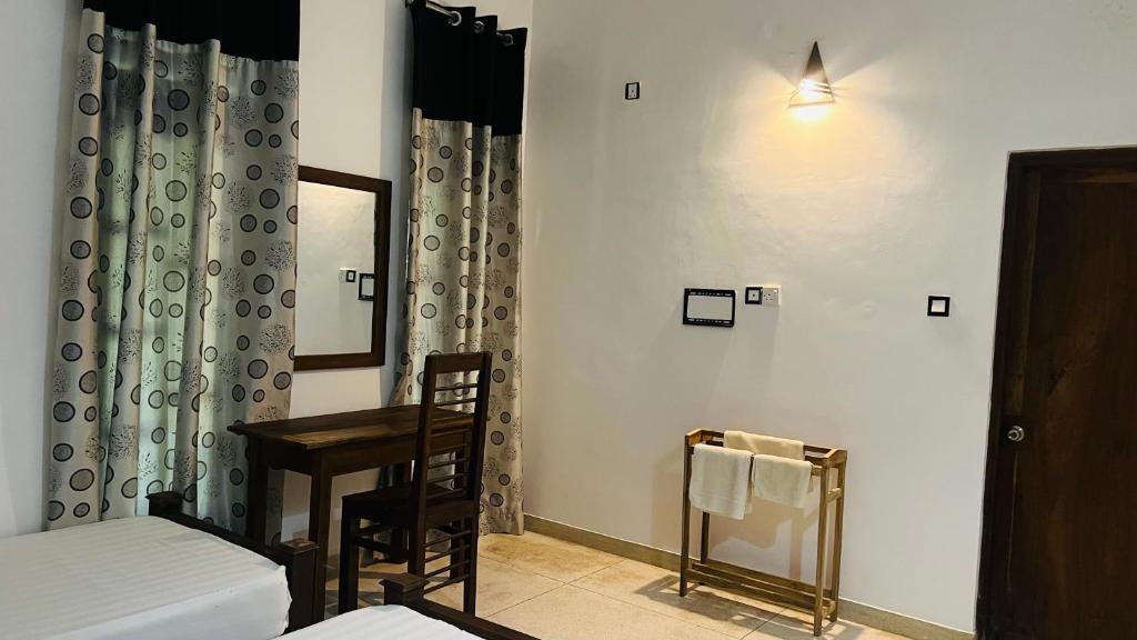 Postel nebo postele na pokoji v ubytování Kingfisher Resort & Retreat Sigiriya