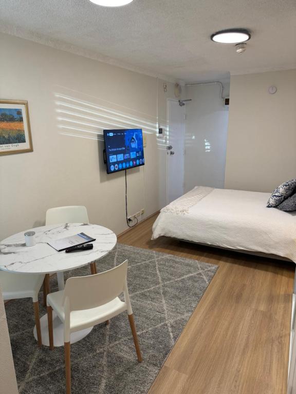 Sam the Central Studio - One-Bedroom Apartment