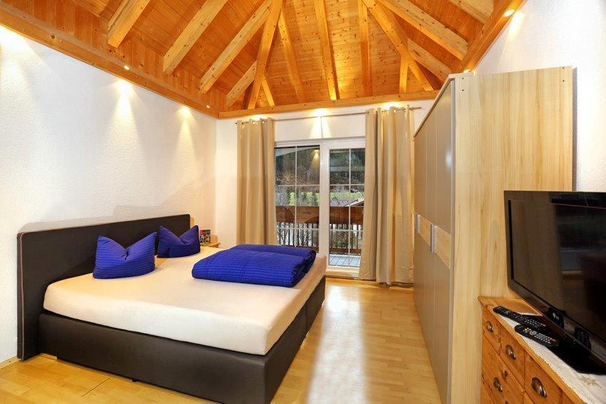 Postel nebo postele na pokoji v ubytování Hotel Stecher