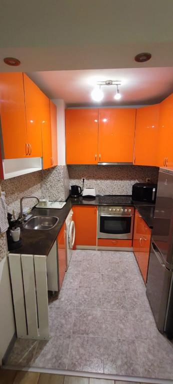 Kuchyň nebo kuchyňský kout v ubytování Cosy Escape in Plovdiv