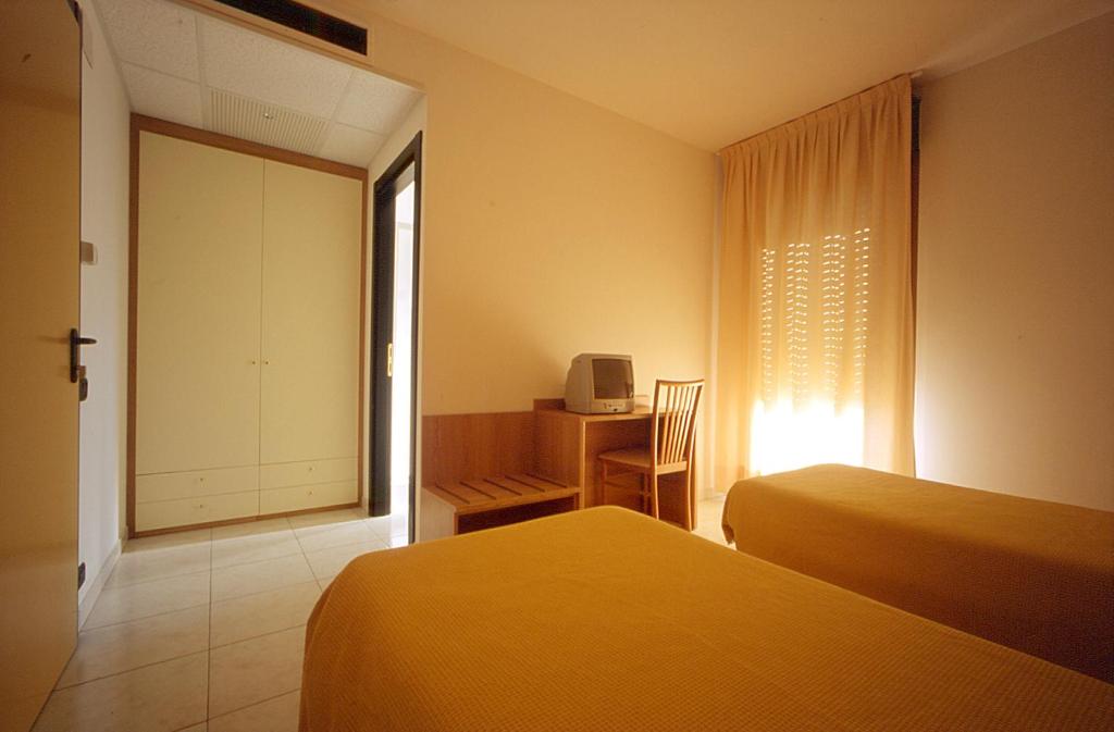 Postel nebo postele na pokoji v ubytování Motel Monterosa