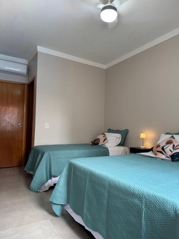 Postel nebo postele na pokoji v ubytování Casa com piscina em Foz do Iguaçu-PR