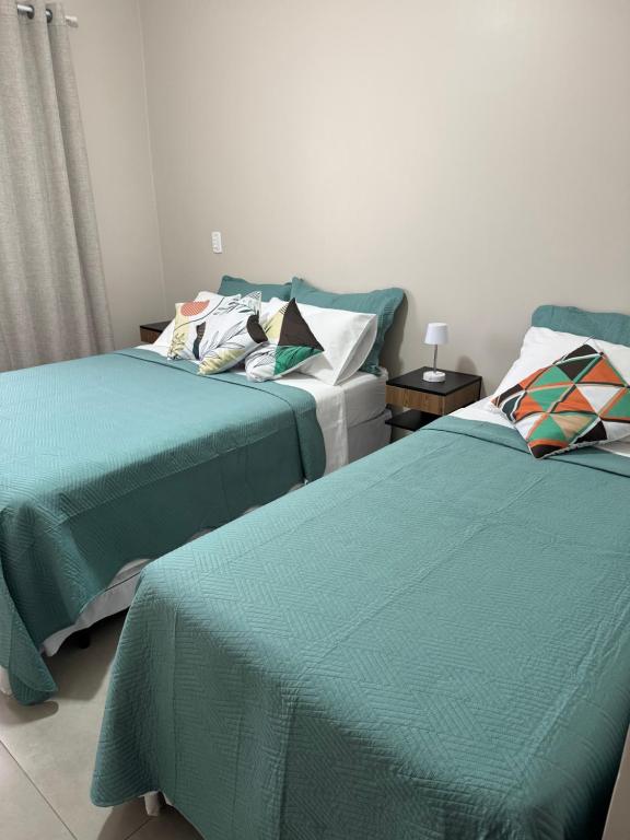 Postel nebo postele na pokoji v ubytování Casa com piscina em Foz do Iguaçu-PR