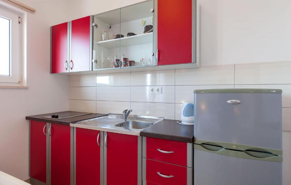 Kuchyňa alebo kuchynka v ubytovaní Apartments Ana