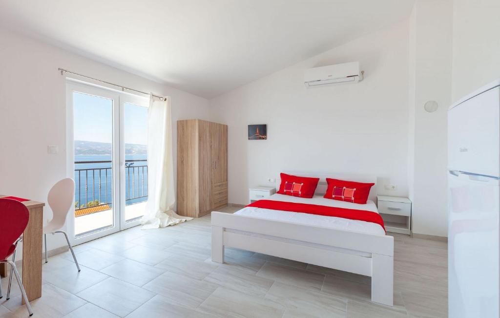 Posteľ alebo postele v izbe v ubytovaní Apartments Ana