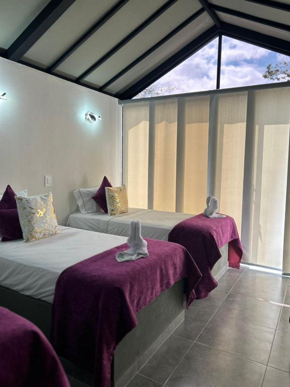 Postel nebo postele na pokoji v ubytování STAR CENTER Hotel Boutique