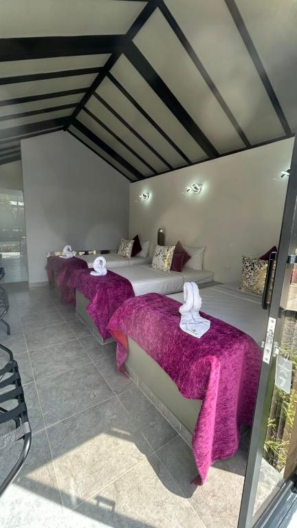 Postel nebo postele na pokoji v ubytování STAR CENTER Hotel Boutique