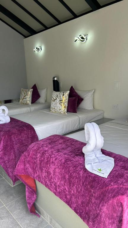 Postel nebo postele na pokoji v ubytování STAR CENTER Hotel Boutique