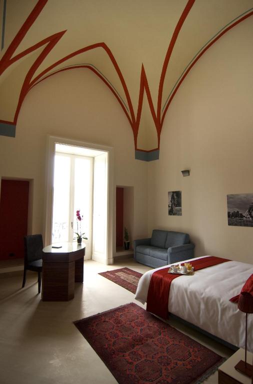 Postel nebo postele na pokoji v ubytování Alvino Suite And Breakfast