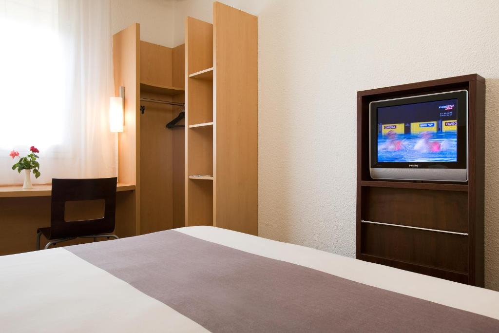 Postel nebo postele na pokoji v ubytování Ibis Cotonou