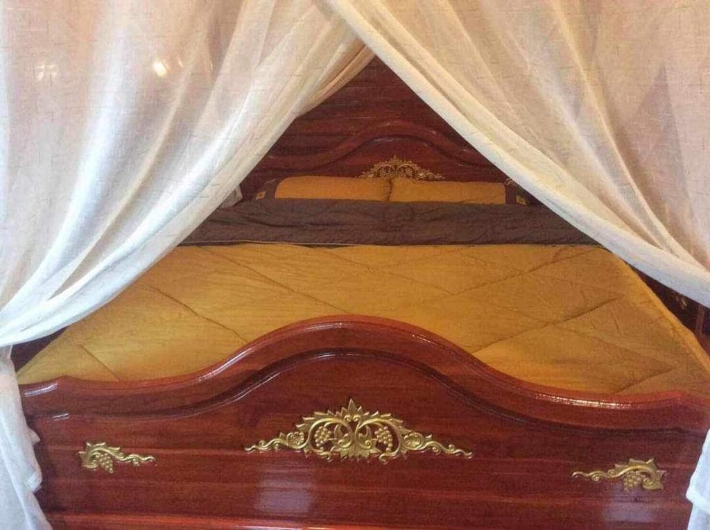Llit o llits en una habitació de Rai Phuchat