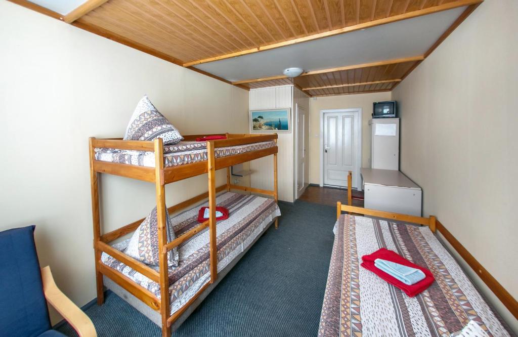 Postel nebo postele na pokoji v ubytování Guest House Podobovets 2000