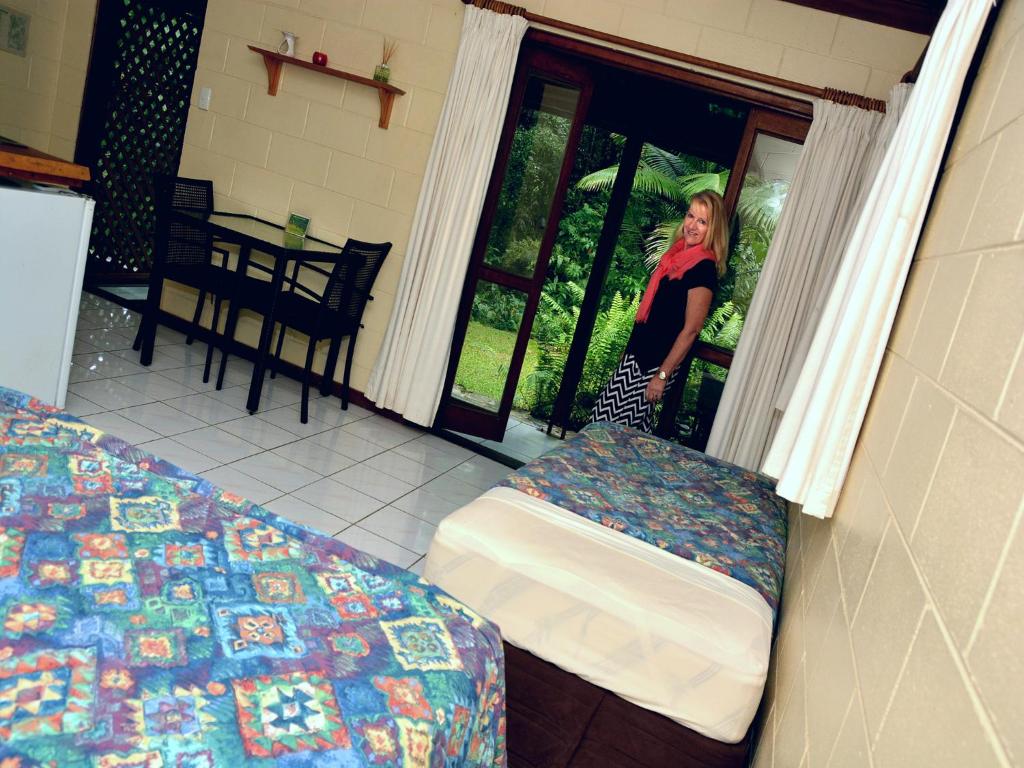 Postel nebo postele na pokoji v ubytování Daintree Deep Forest Lodge