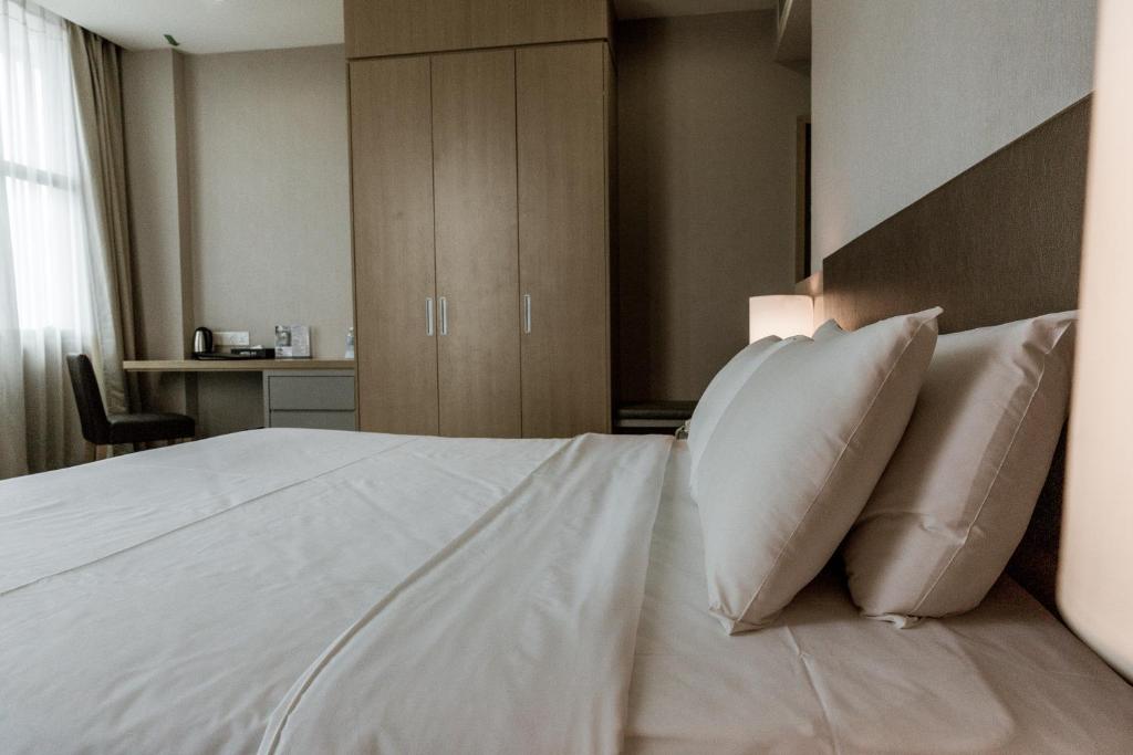 Postel nebo postele na pokoji v ubytování Hotel N°5