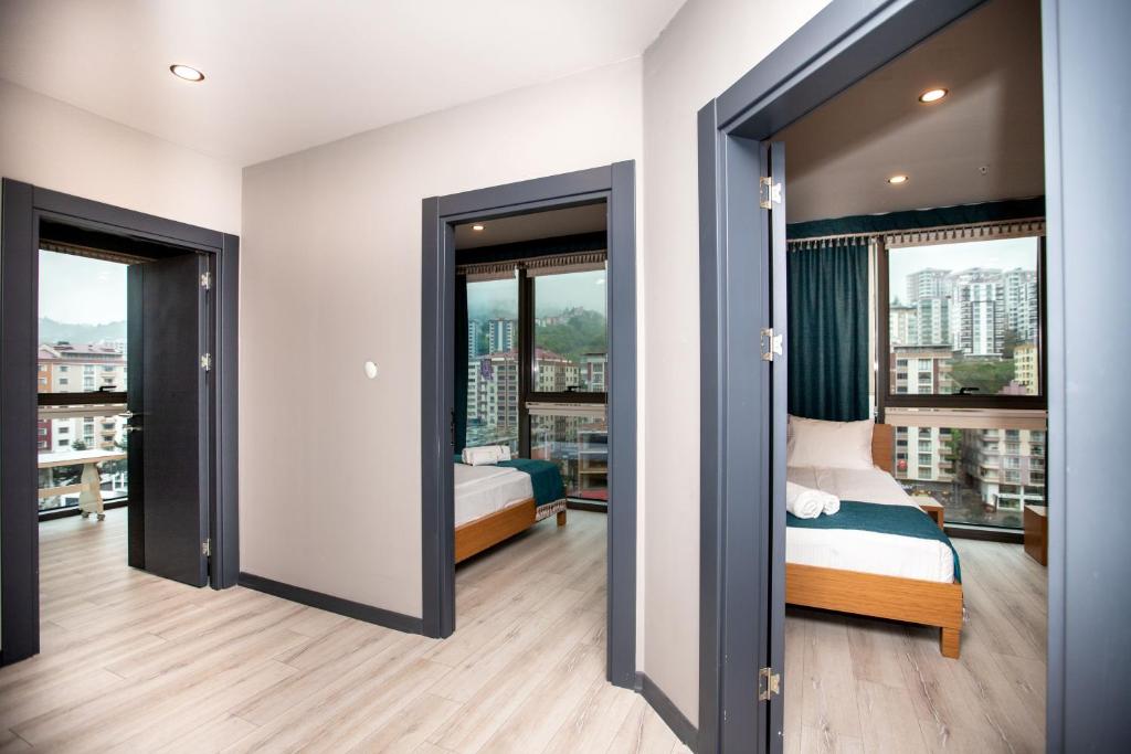 Postel nebo postele na pokoji v ubytování Marina Green Suite & Residence