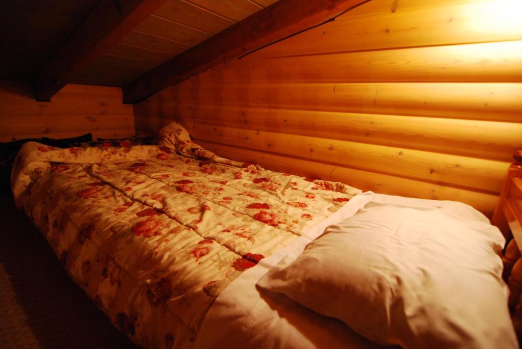 Postel nebo postele na pokoji v ubytování Lithos
