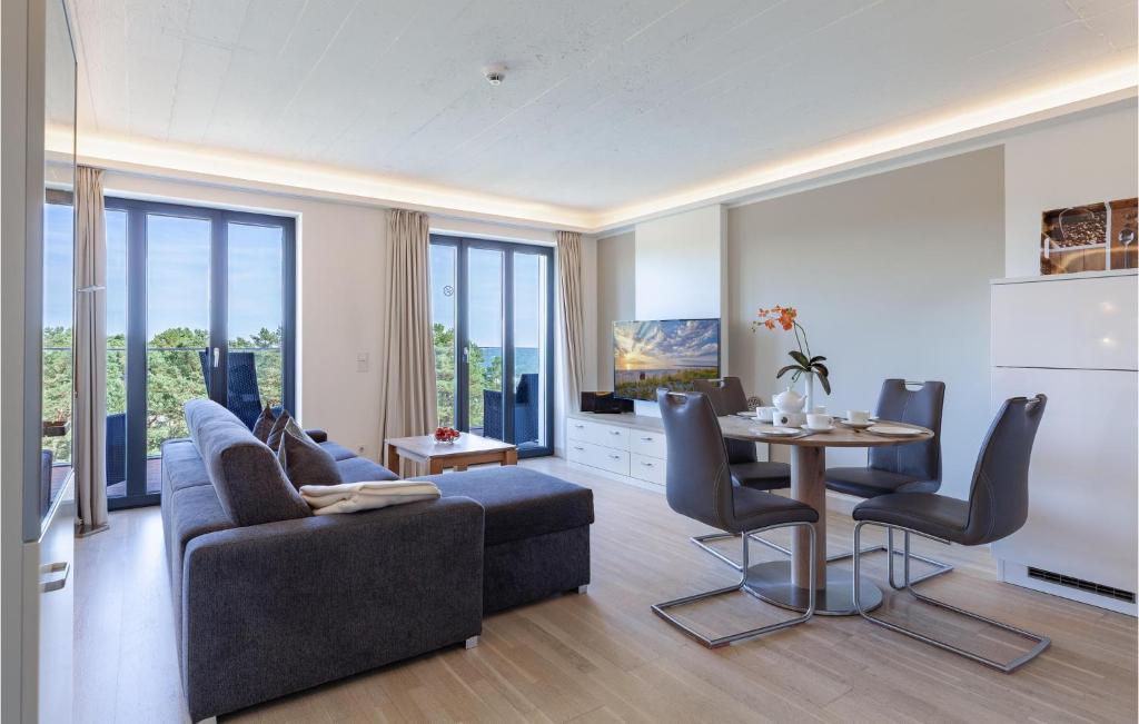 a living room with a couch and a table at Prince in Binz