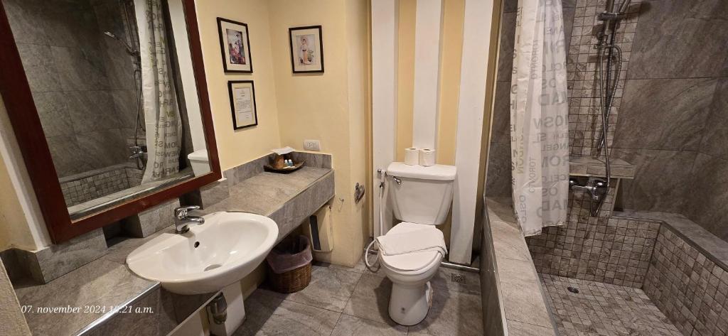 Koupelna v ubytování Nirvana Boutique Suites
