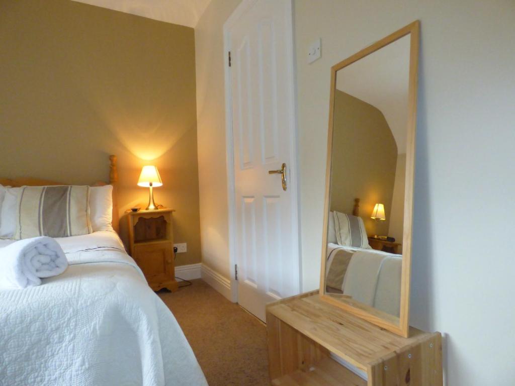 Postel nebo postele na pokoji v ubytování Parkhouse B&B