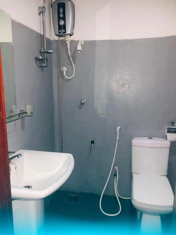 Koupelna v ubytování Priya Homestay Kandalama