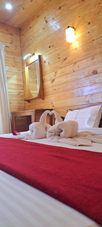 Postel nebo postele na pokoji v ubytování Shaan Coco Palms Beach Resort
