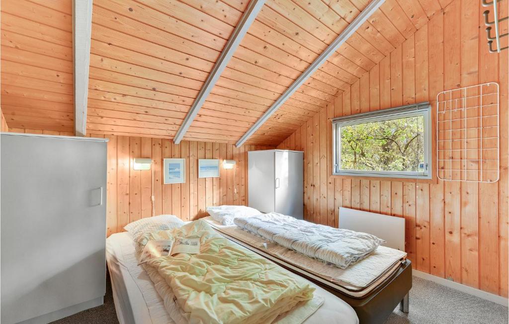 Postel nebo postele na pokoji v ubytování Holiday Home Skovbrynet Tarm Iv
