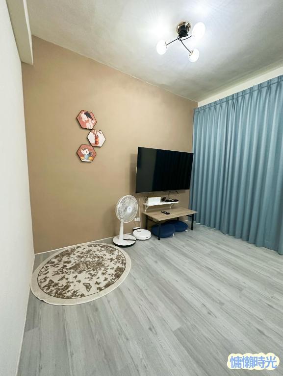 TV a/nebo společenská místnost v ubytování Lazy Time B&B