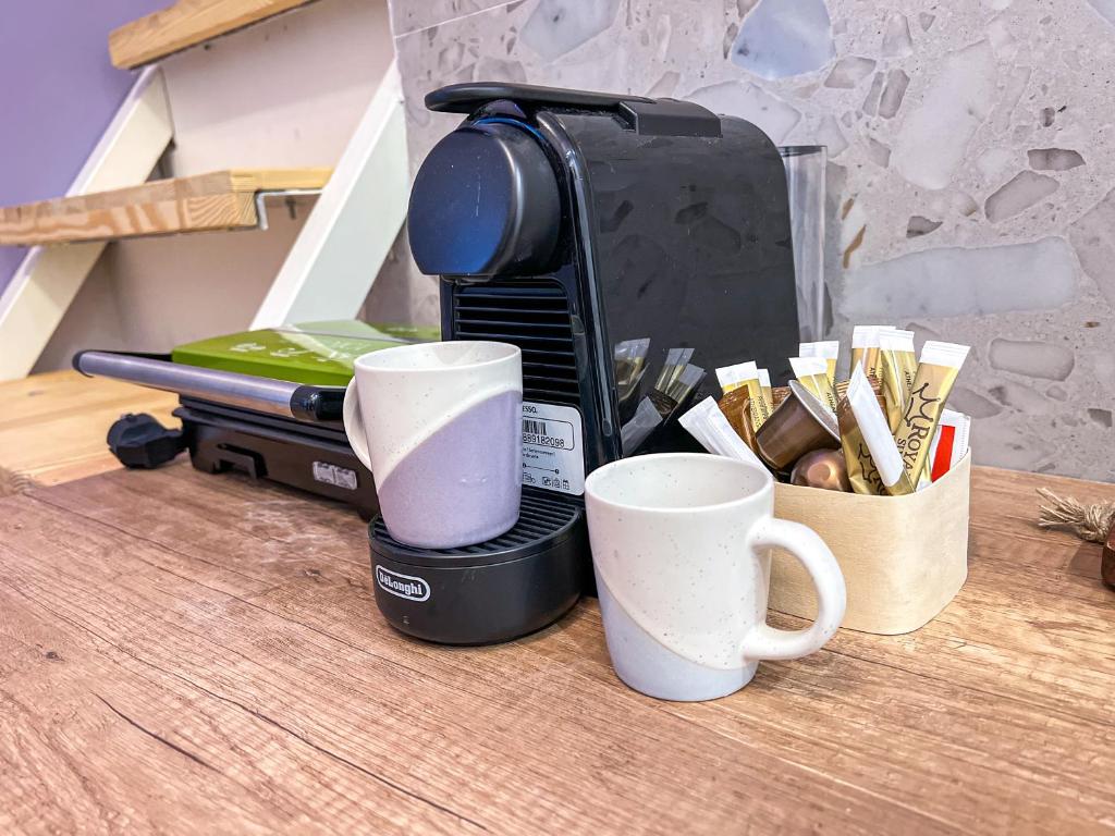 Coffee and tea making facilities at SpaceFour "DownTown Comfy Loft" by #Gimispace Rentals
