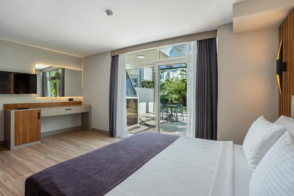 Postel nebo postele na pokoji v ubytování Simena Comfort Hotel