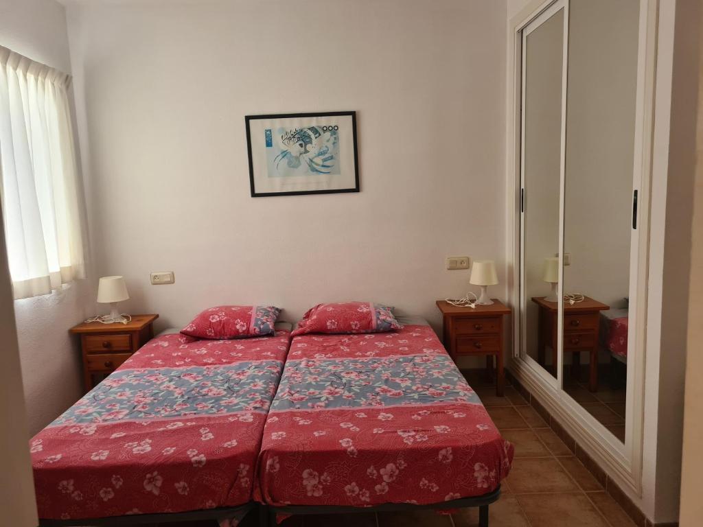 Postel nebo postele na pokoji v ubytování As050 Inviting 2-Bed House La Casita