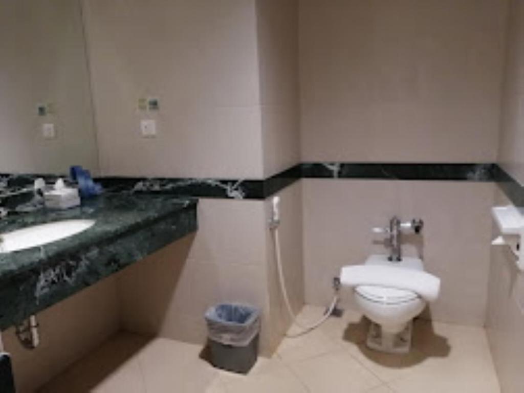 Koupelna v ubytování Grand Elite Hotel Pekanbaru