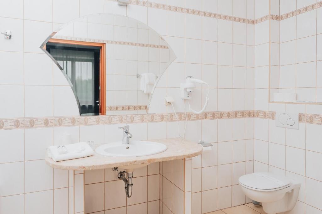 Koupelna v ubytování Hotel Sphinx