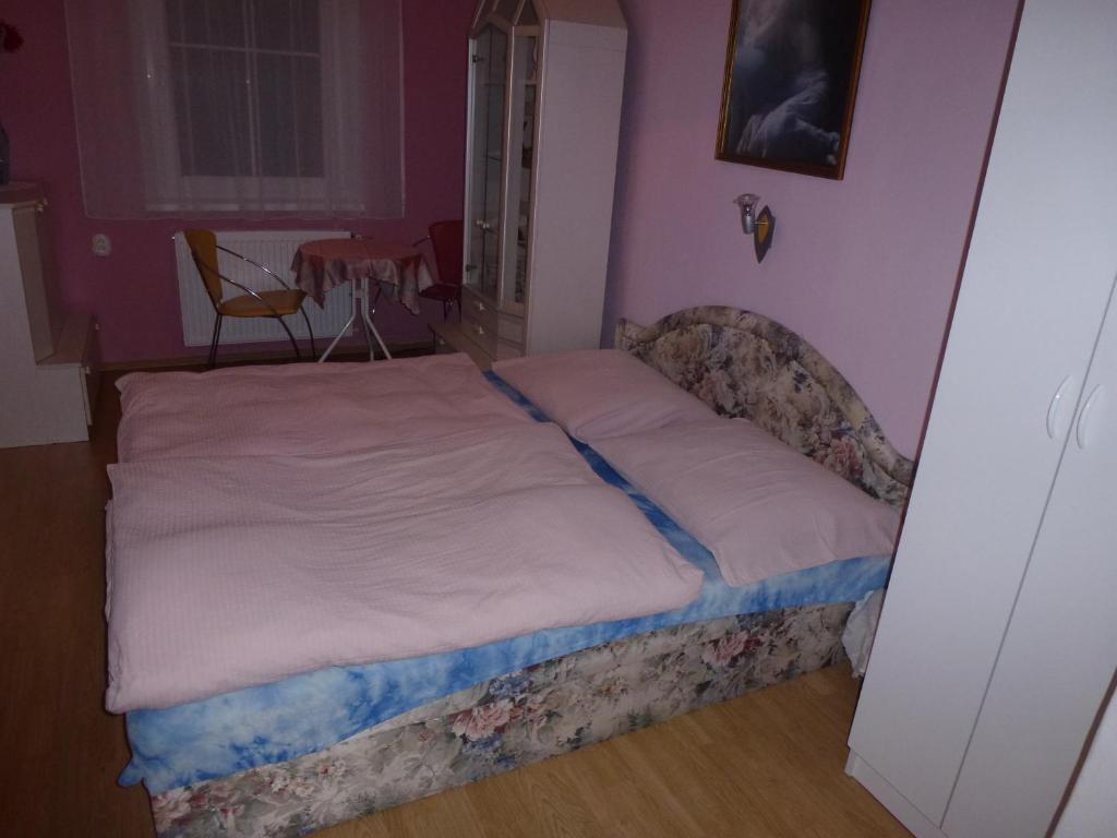 Postel nebo postele na pokoji v ubytování Pension Rak