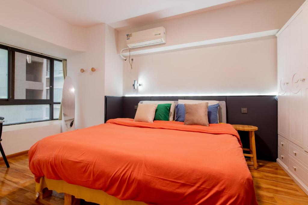 Postel nebo postele na pokoji v ubytování Ban Xia Sunshine Hotel- Drum Tower & YONGNING Gate Branch