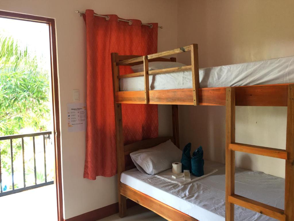 Postel nebo postele na pokoji v ubytování Jenises Inn